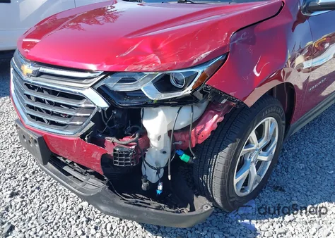 2018 Chevrolet Equinox Premier z USA, uszkodzony, nr VIN 2GNAXVEV4J6134592